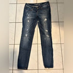 Navy blue rip jeans
